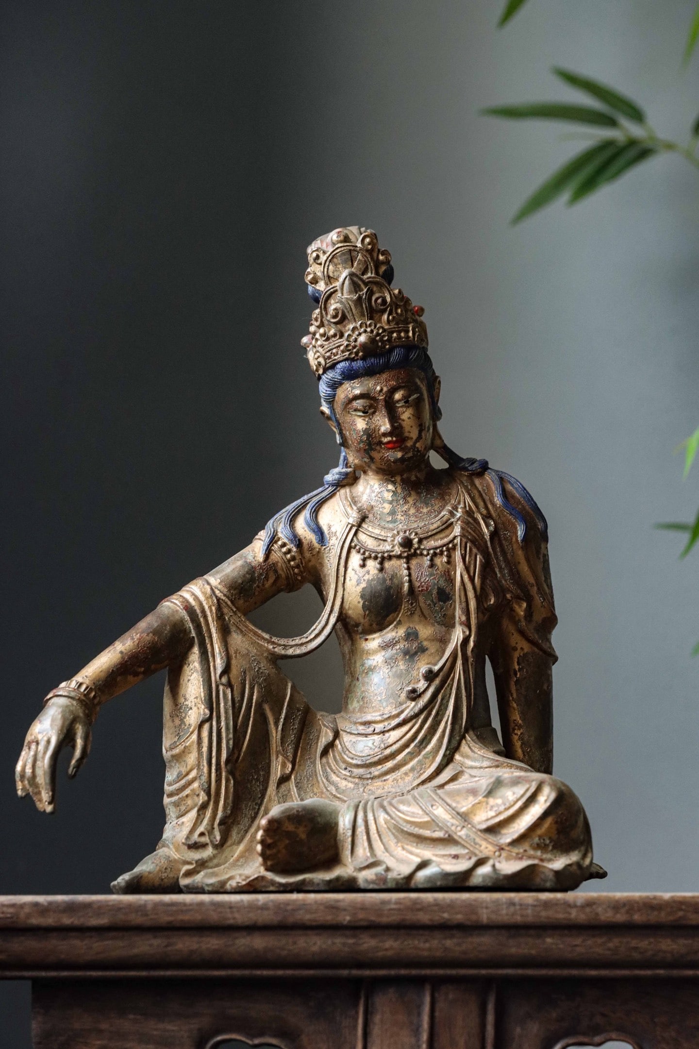QING DYNASTY GILDED BRONZE STATUE OF THE FREE AND EASY GUANYIN: Weight:2600g (5.73lb) Height:29cm (11.42in) Width:24cm (9.45in) Thickness:13cm (5.12in) Gilt bronze Avalokitesvara (Free and Easy Guanyin) statue. Ornate crown & pearl necklace, relaxed half-lotus pos