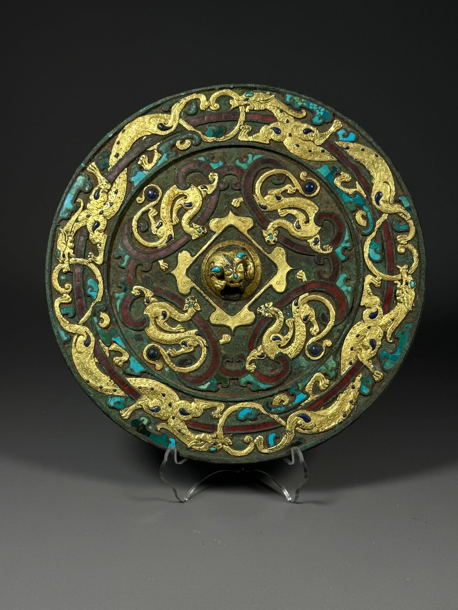 BRONZE MIRROR WITH GILDED, TURQUOISE AND GLAZED DRAGON AND PHOENIX PATTERNS FROM THE WARRING STATES (1 of 6)