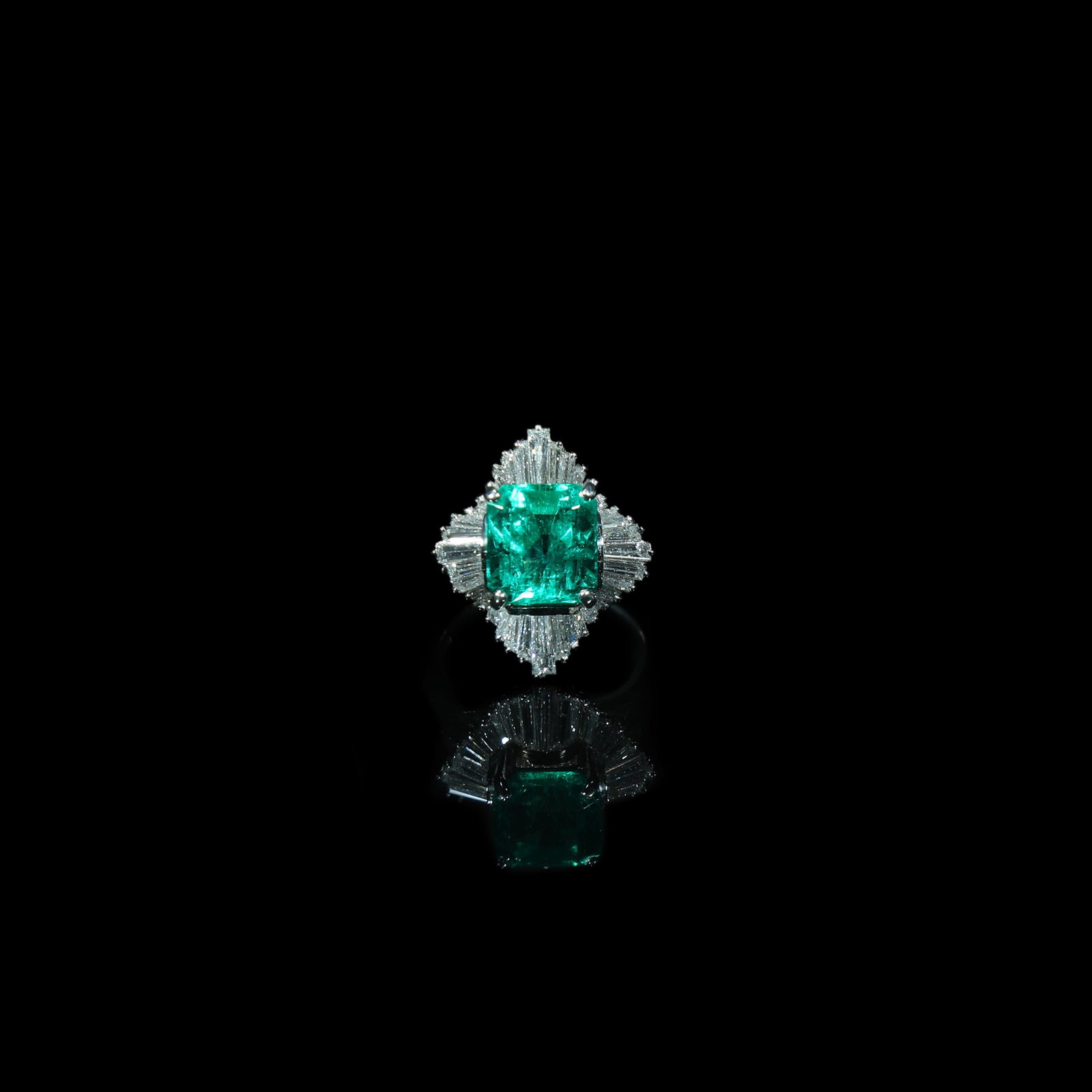 PT900 Emerald and Diamond Ring, 3.47 CT: Stone Dimensions:1.8cm *2cm Wt:11.7g Ring Size: US 7 Central stone: 3.47 ct, Colombian origin. Accent diamonds approx. 1.64 ct.