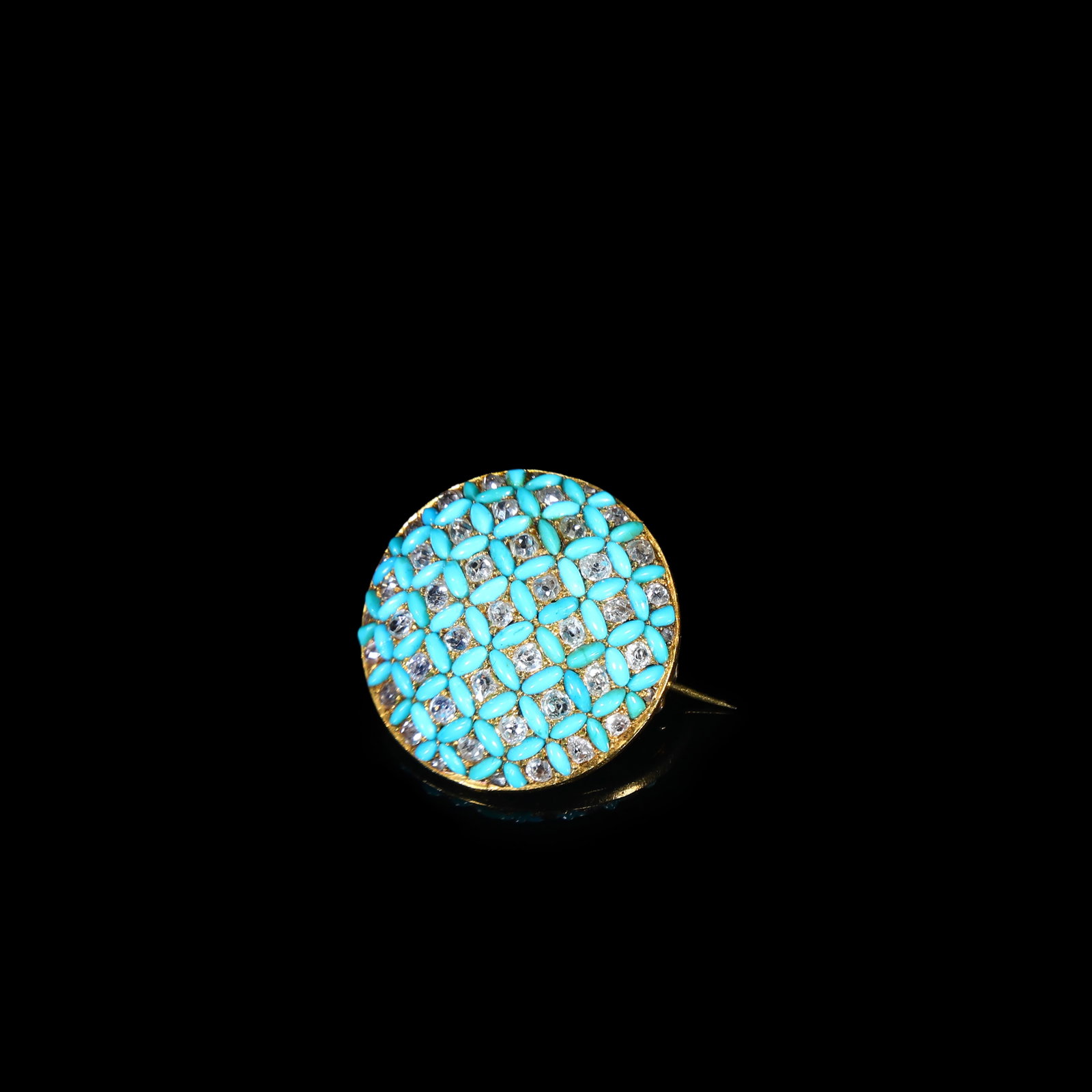 Late-Victorian (Circa 1870-1890) Solid-Gold Turquoise & Old-Cut Diamond Circular Brooch: D:2.48cm Wt:7g Late-Victorian (Circa 1870-1890) circular brooch in solid-gold. The circular plaque densely set in an interlaced lattice pattern with marquise-shaped turquoises alternating with old-cut