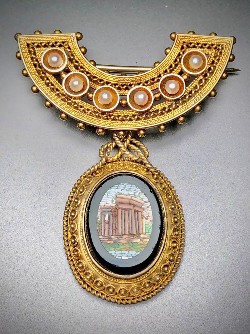 Mid-19th Century Italian Micromosaic Multi-Wear Brooch-Pendant depicting Grand Tour Roman Ruins with: 12.46g | 3.2*6.5cm Grand Tour, theme of aristocratic European travel.Inspired by the remains of the early 1st-century BC Roman Empire: Temple of Vesta, Tivoli.Vesta, Roman goddess of the sacred fire.T