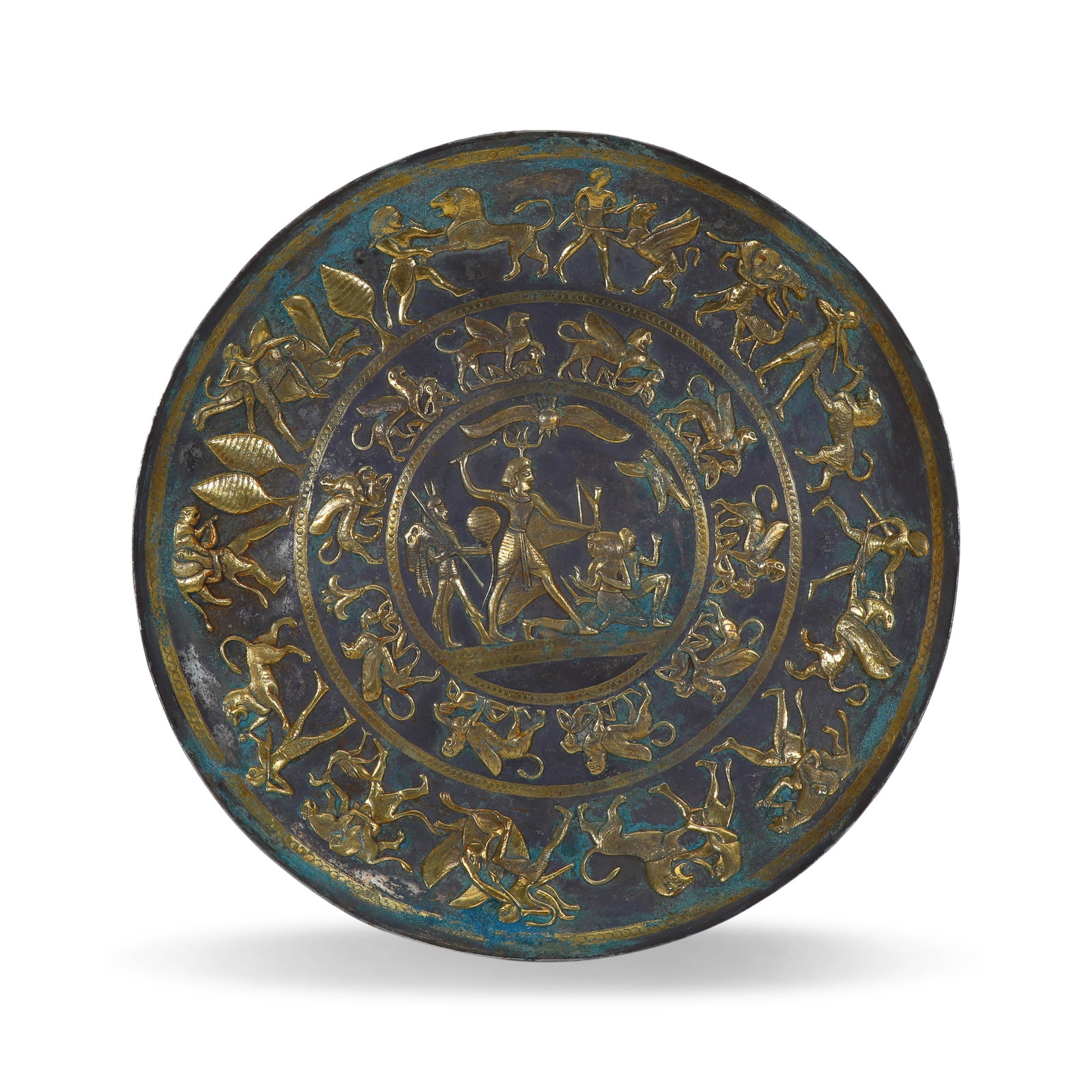 Plate, Sasanian-Persian, 3rd-7th Century, Gilt-Silver, Multi-Register Decoration with Central Royal: D:39cm Wt:968g Sasanian-Persian gilt-silver plate, 3rd-7th century, a major luxury metal vessel of the Sasanian court, its decoration continuing Achaemenid Persian artistic traditions. The plate face