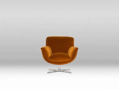 Pop Chair - Velvet, Acorn / Chrome Base: The Pop Chair, inspired by the iconic egg chair. Orior founder Brian McGuigan was inspired by Arne Jacobsens design when he made this piece. Retail value: $5,300. The Pop chair is being auctioned as