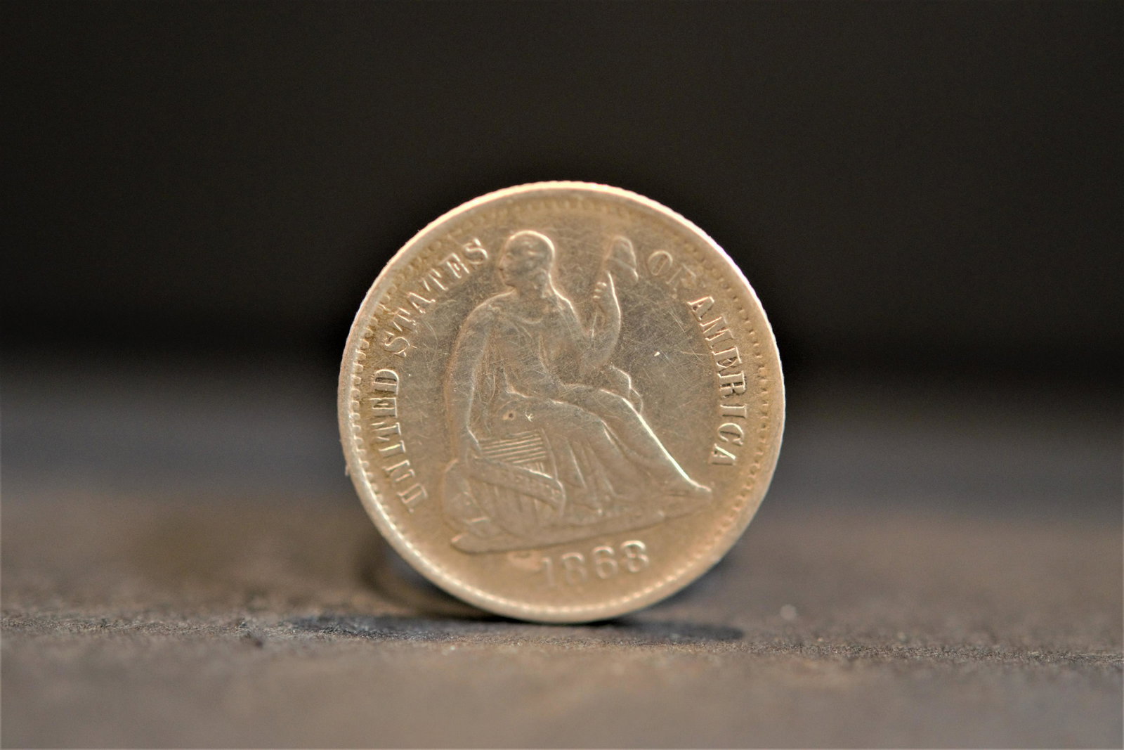 1868-S Seated Liberty Half Dime XF+ Cleaned (1 of 2)