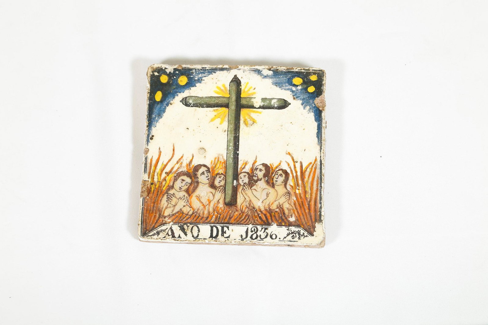 Souls in purgatory: 14 x 14 cm Polychrome ceramic on tile, with a scene from Purgatory, dated 1836. Small drops of color.
