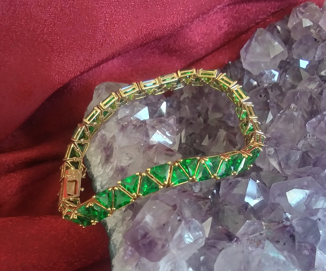 Gold over Sterling Emerald green stone bracelet: Gold over Sterling Silver with Emerald green stone bracelet. Brand new piece. HEAVY