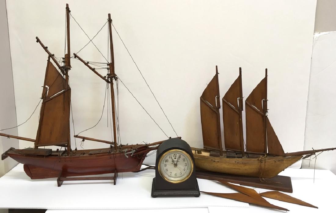 VINTAGE SAILING SHIP MODELS & TELECHRON CLOCK: Two vintage wooden sailing ship models (in need of repair) plus a vintage electric clock by Warren Telechron Co. (Mass.) No. 78076 in working condition.