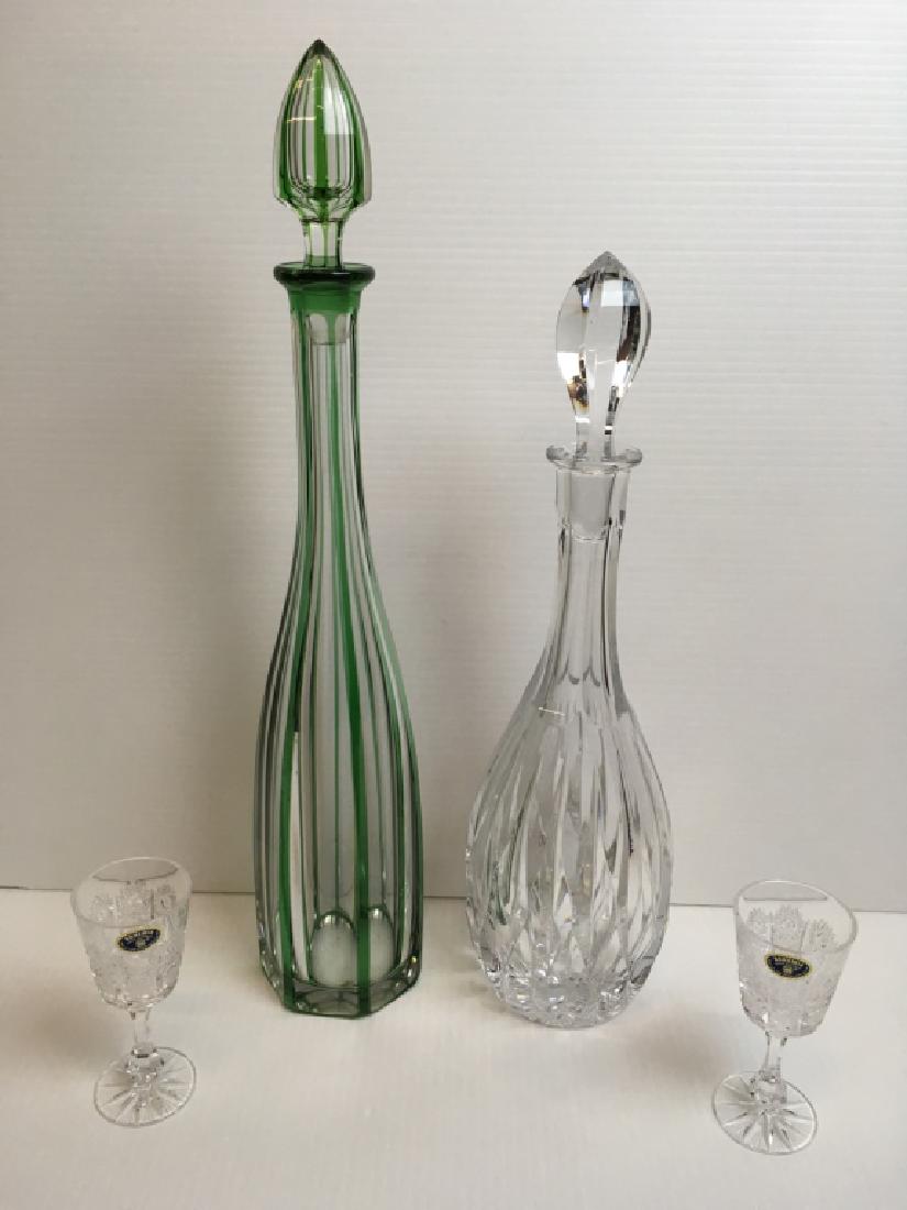 4 PCS OF GLASSWARE - DECANTERS & STEMWARE: 18" green & clear blown decanter (chip on stopper bottom - see pic), crystal decanter & 2 Bohemia Czech Republic crystal 4.5" stems.