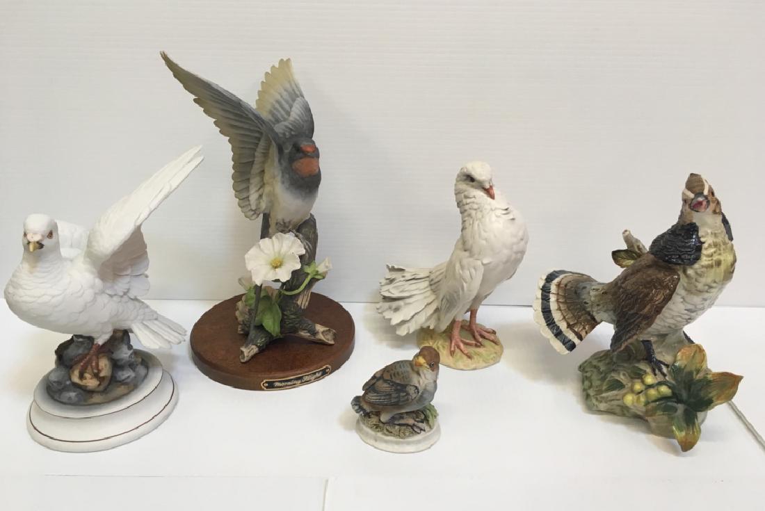 5 HAND PAINTED PORCELAIN BIRD FIGURINES: Includes 7.75" h Dove Pigeon by Goebel W. Germany 1978 incised 38-155 20, 11.25" HOMCO "Morning Flight" American Swallow mounted on wood base, 8.5" Norleans figurine, 8.5" h white dove by Andrea & 3.2
