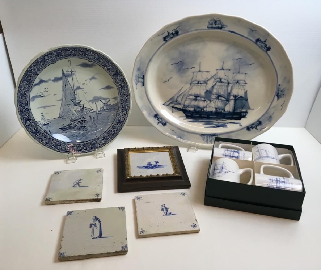 10 PCS BLUE & WHITE DECORATIVES: 12" Boch Delfts round charger, 18" x 15" oval ship design platter marked Oxney Green England, 4 antique hand painted 5" sq tiles (1 framed) plus set of 4 MIB vintage Richard Bishop sailing ship mugs.