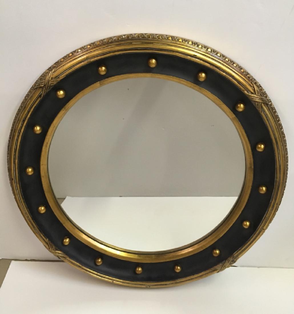 FEDERAL STYLE GIRANDOLE MIRROR: Wood and composition round girandole mirror criss cross reeded edging, balls & half circle with dot decoration - black well in antiqued gold leaf finish - 29 7/8" diameter.