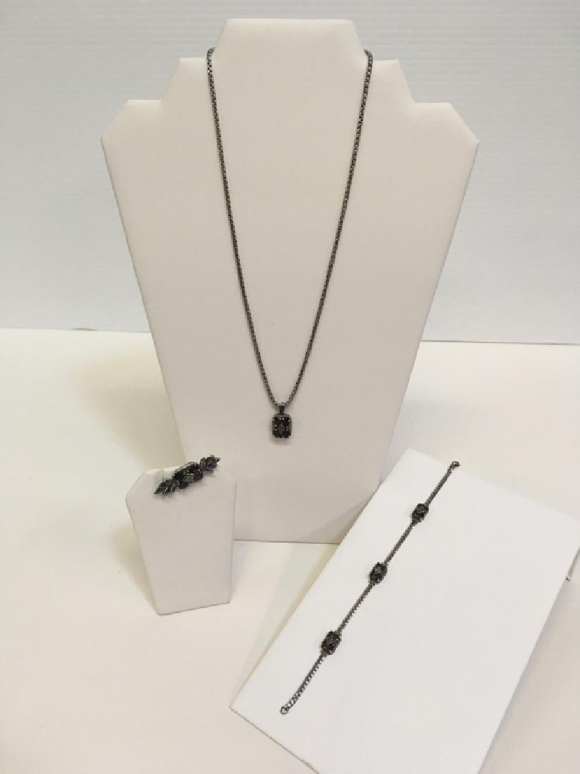 3 PC SET MARCASITE & STERLING JEWELRY: Marcasite & red stone set in sterling silver - 20" necklace, 7.5" bracelet & 1.75" pin. Set weighs 34g.
