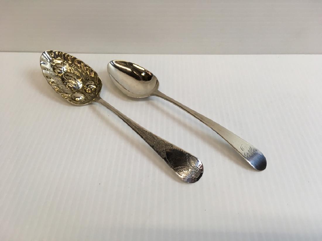 TWO PCS LATE 18TH / EARLY 19TH C LONDON SPOONS: Tablespoon with maker's mark of HB in script - Hester Bateman 1789-90, hallmarked London, England, date is unreadable due to polishing. The hallmarks show the Leopard's Head Crowned (script monogram).