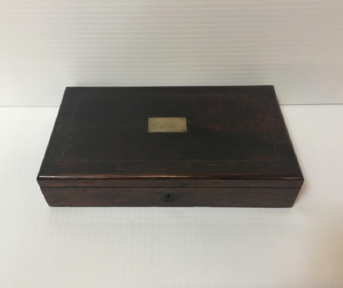 ANTIQUE DRAFTING SET FITTED IN WOODEN BOX: 19th C mahogany box inlaid with brass - 9 1/8" w x 5 1/8" d x 1 7/8" h - fitted interior with drafting tools.
