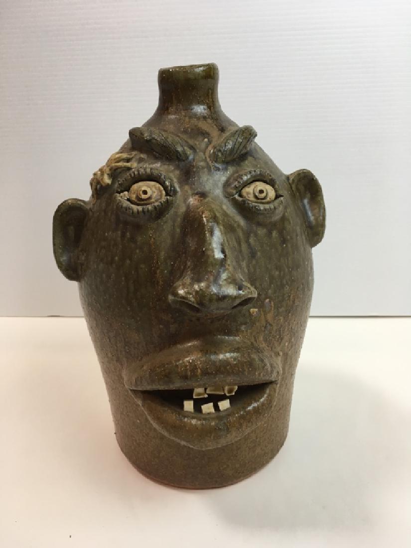 LARGE NC POTTERY FACE JUG - SIGNED CHARLIE BROWN: Brown's Pottery Arden NC hand made by Charlie Brown #1 spider marked on bottom & dated 1991 - 13" h x 8" diameter.