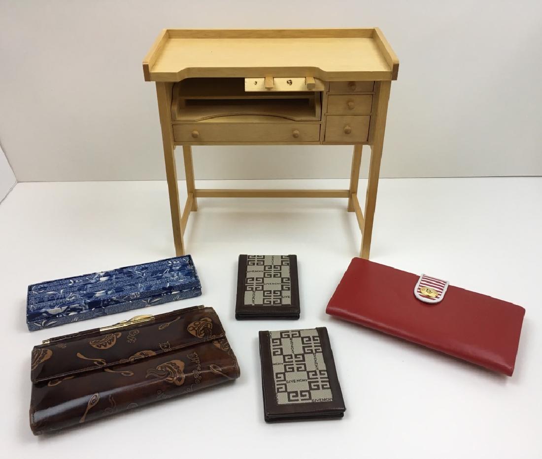 4 VINTAGE WALLETS & MIRRORS PLUS JEWELRY BOX: Jewelry box shaped as a jeweler's bench - 10" l x 5" w x 10" h, red Christian Dior wallet, Gary's leather brown leather wallet, 2 Givenchy wallet mirrors & box of blue & white pencils by Two's Company