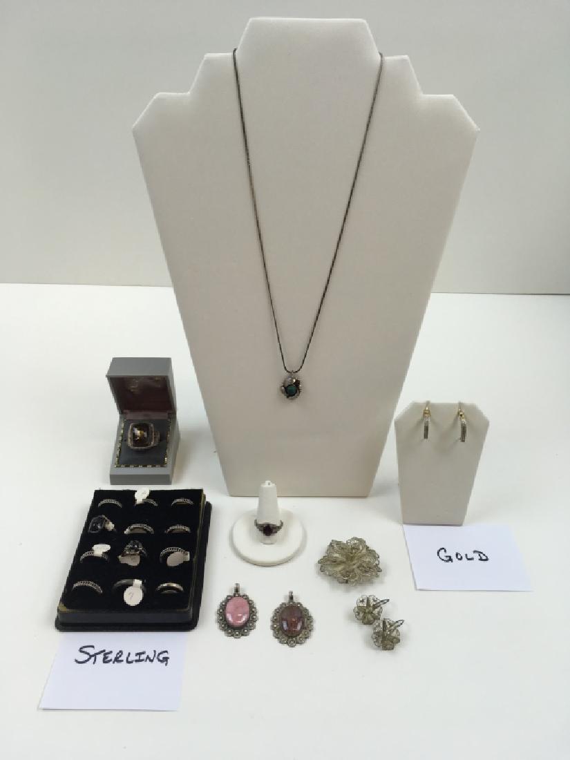 22 PCS OF STERLING / 925 & 10 YELLOW GOLD JEWELRY: Includes - 10k yellow gold with diamond chips hoop earrings 3g, 13 marked 925 rings, 2 tested sterling stone pendants 8g each, unmarked hand made men's ring with stone size 12 1/2 - possibly Native Am