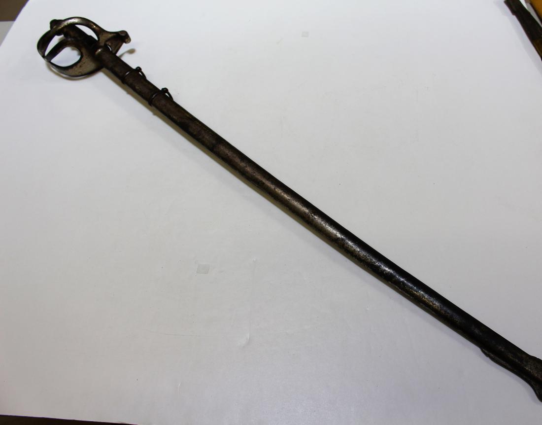 CUTLASS & SCABBARD: Open Handle - 40.5" in length - No Makers Mark. Fair condition.