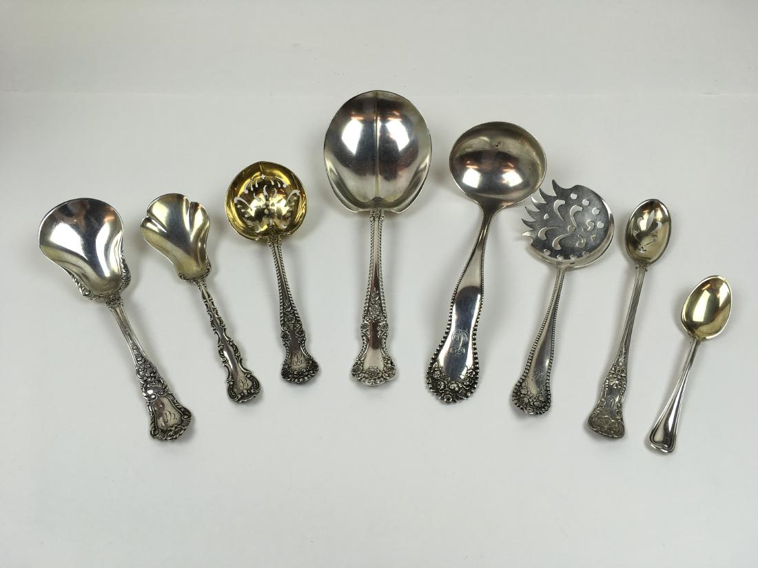 8 PCS OF STERLING FLATWARE BY GORHAM: 6" "Old Baronial" sugar shell 38g (C mono), 5.5" "Strasbourg" sugar shell 20g (EC mono), 5.5" "Cambridge" gold washed sugar sifter 31g (EC mono), 7 5/8" "Cambridge" serving spoon 54g, 6.75" "Lancaster