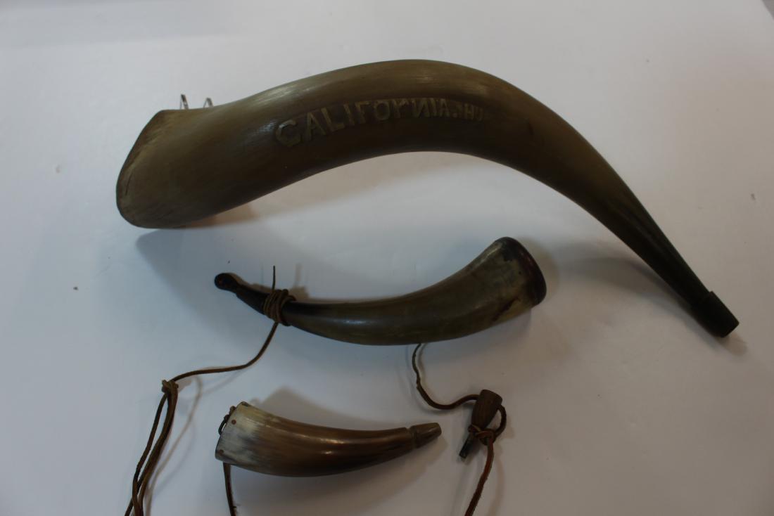 THREE HORN PIECES: Contemporary powder horn flasks and what may be a novelity moose call with an applied carved "California HJ" - The two flasks - 8" and 11" and the horn 21 x 4.5"
