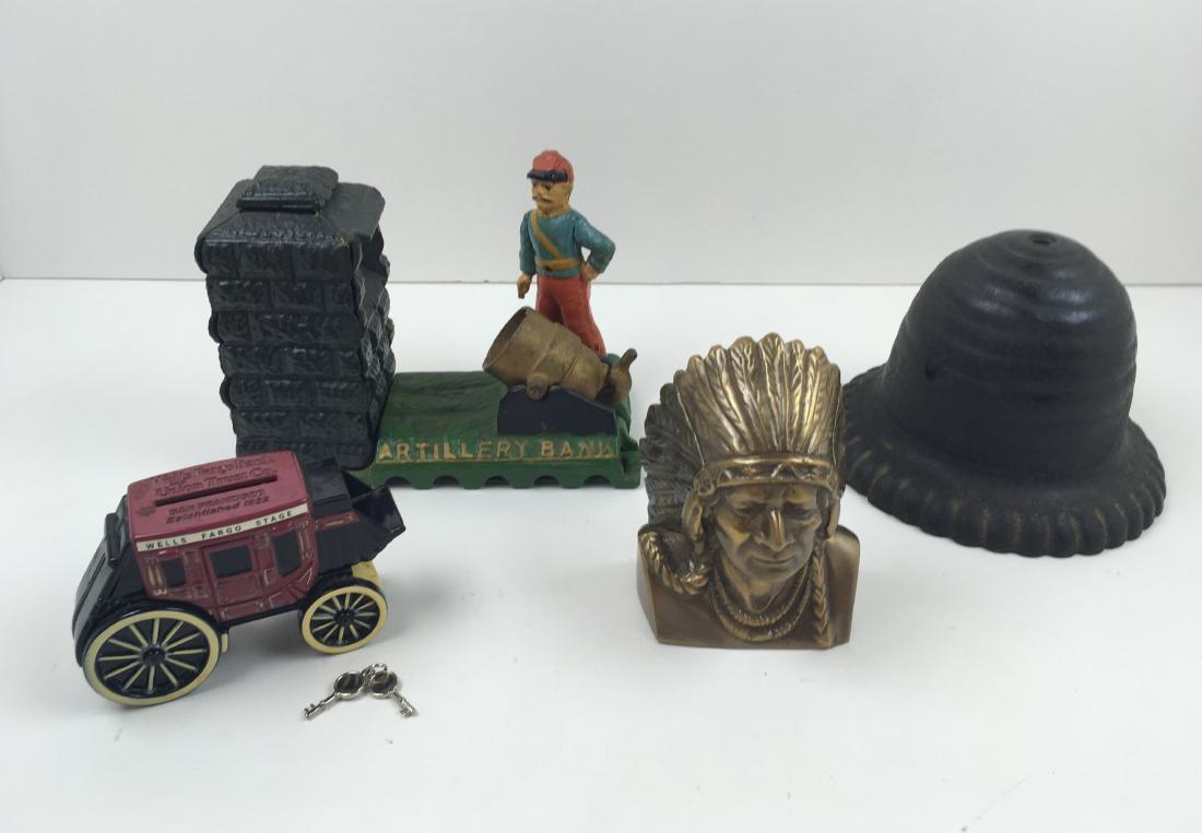 4 PCS - METAL BANKS & CAST IRON STRING HOLDER: Reproduction cast iron mechanical bank of soldier shooting canon 7.75" l x 5.5" h (made in Taiwan), vintage brass still bank marked "Indian Head National Bank" (replacement screw) 5" h, Wells Fargo Ba