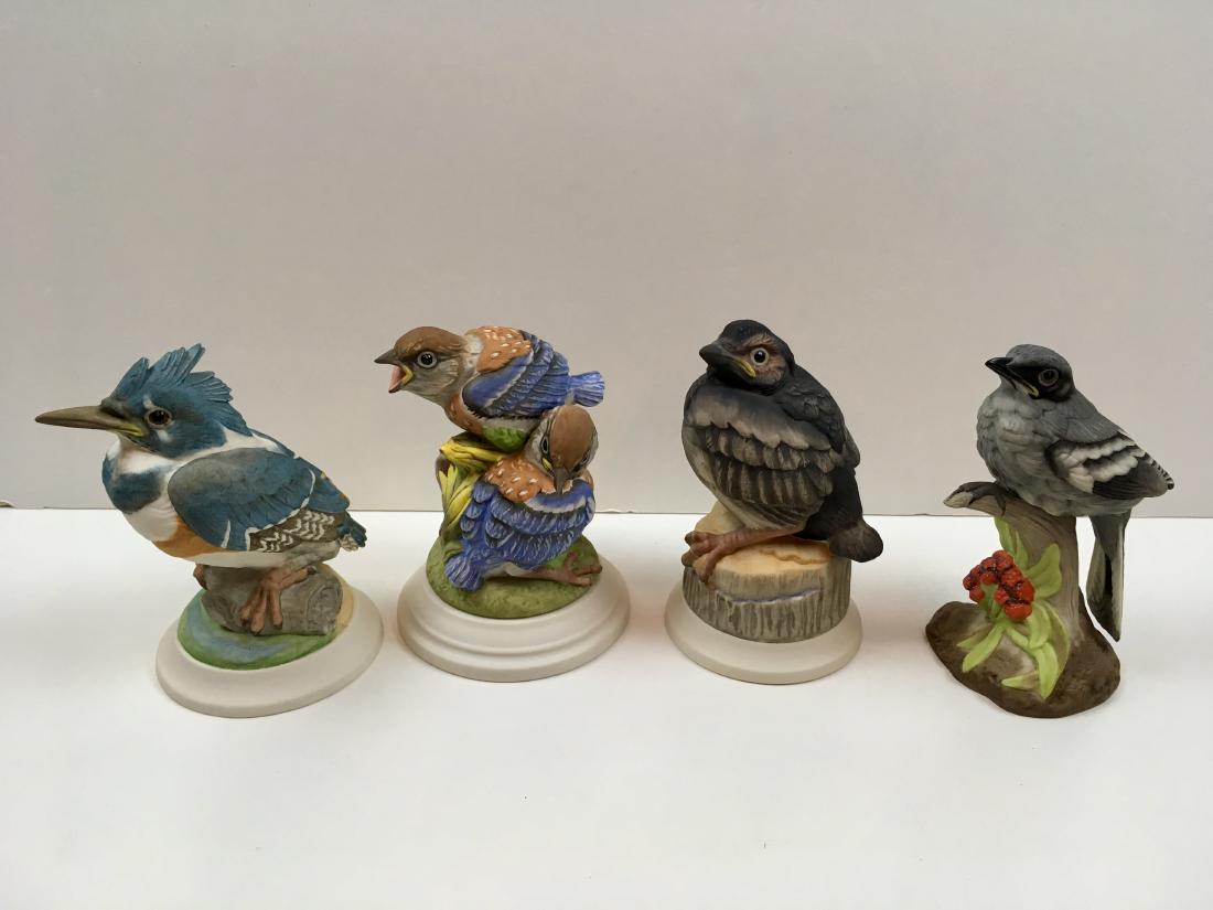 FOUR BOEHM PORCELAIN FIGURINES (1 of 9)