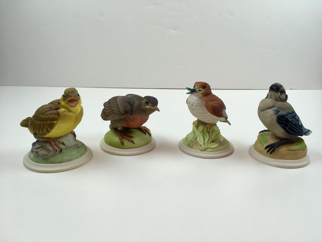 FOUR BOEHM PORCELAIN FIGURINES (1 of 9)