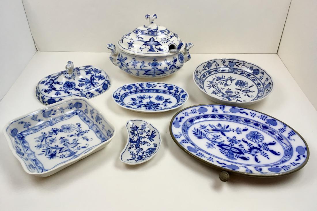 SEVEN PCS OF BLUE ONION CHINA: Blue Onion pattern china with "Meissen" blue oval and "Meissen" cross marks - includes 10" oval platter, 10.5" diameter serving bowl, 9.25" square serving dish, 6.75" bone dish, 14.25" oval warming pl