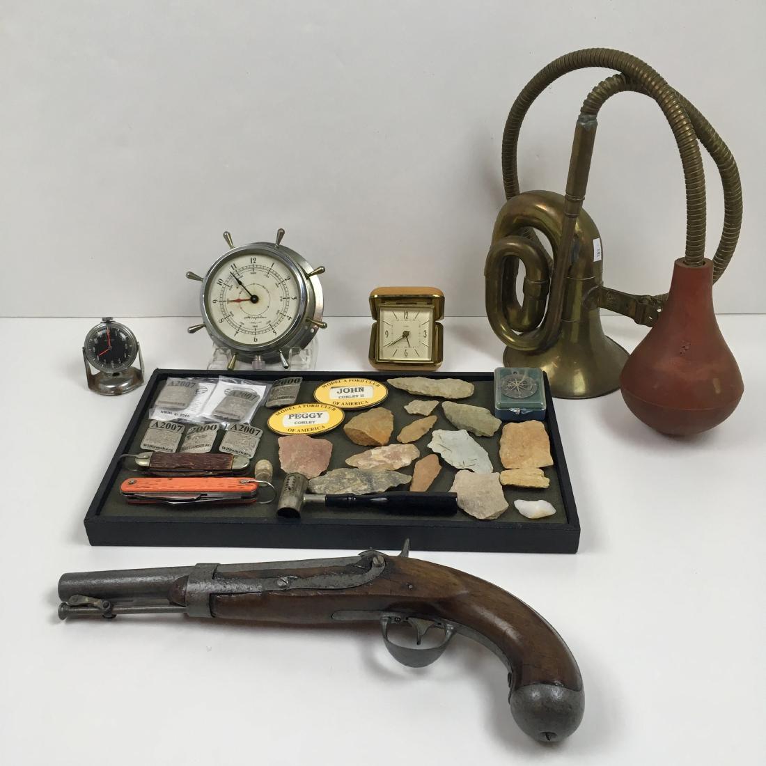 LARGE ASSORTMENT OF COLLECTIBLES: Includes a vintage Condor brass horn made in Japan with squeeze bulb, reproduction percussion pistol 14.5" long, Airguide 7 jewels / 8 day winding ships clock 5" diameter P4592, vintage Westclox model
