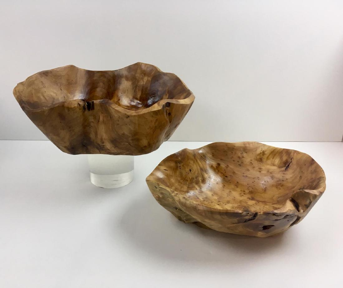 TWO HAND CARVED WOODEN BOWLS: Hand carved burl wood bowls - approximately 12 - 13" long and 4 -4.5" high - large one is signed CON