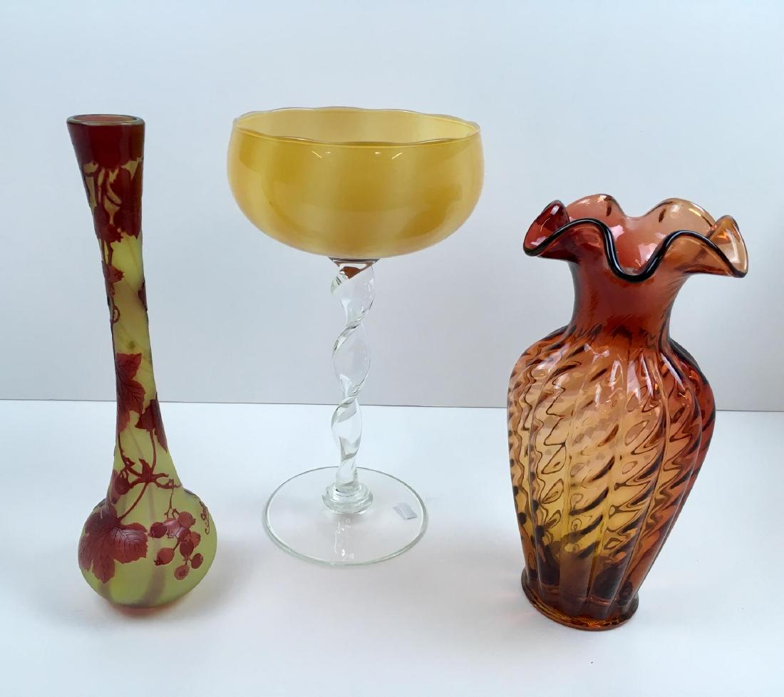 3 PCS OF ART GLASS - VASES AND COMPOTE: Cameo glass 12.75" vase in the Galle style, amber glass with clear twist stem 12.5" compote and a blown glass amberina style 11" vase with an acid etched star on its bottom - All in good condition