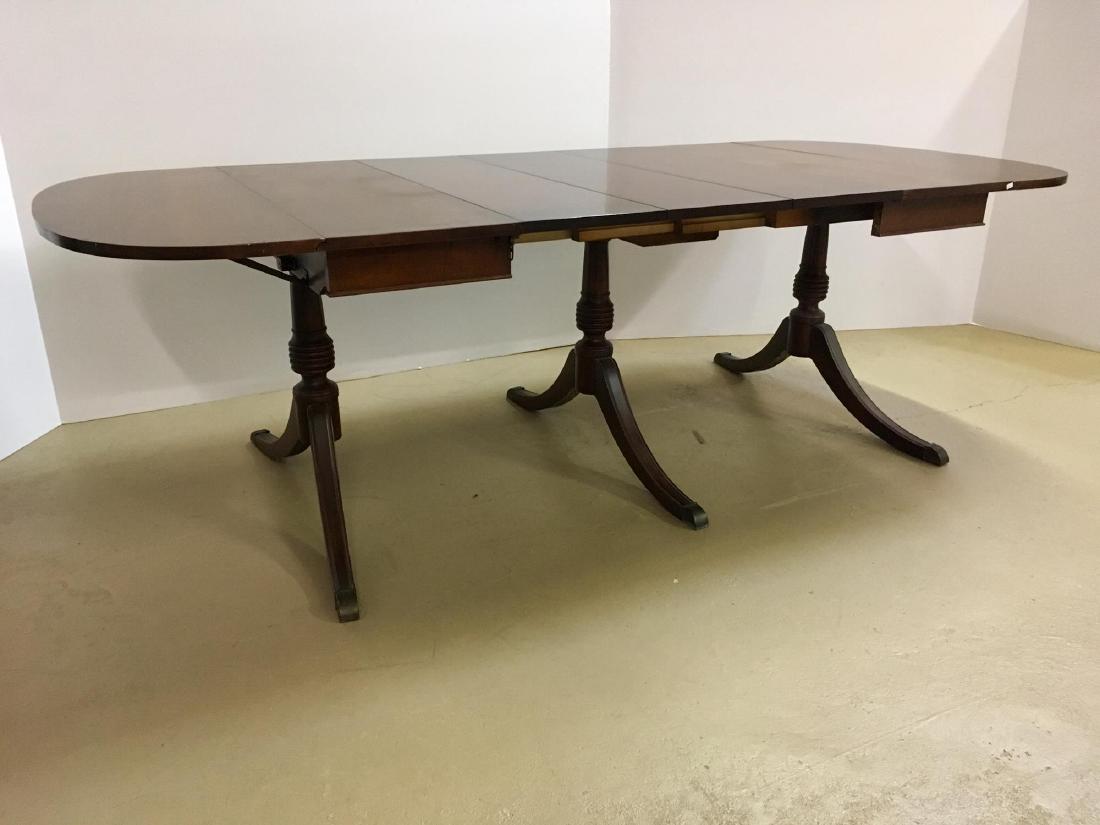 MAHOGANY DUNCAN PHYFE STYLE DINING TABLE: Includes 3 leaves measuring 13" wide - 60.5" l x 42" w x 28.25" h without leaves