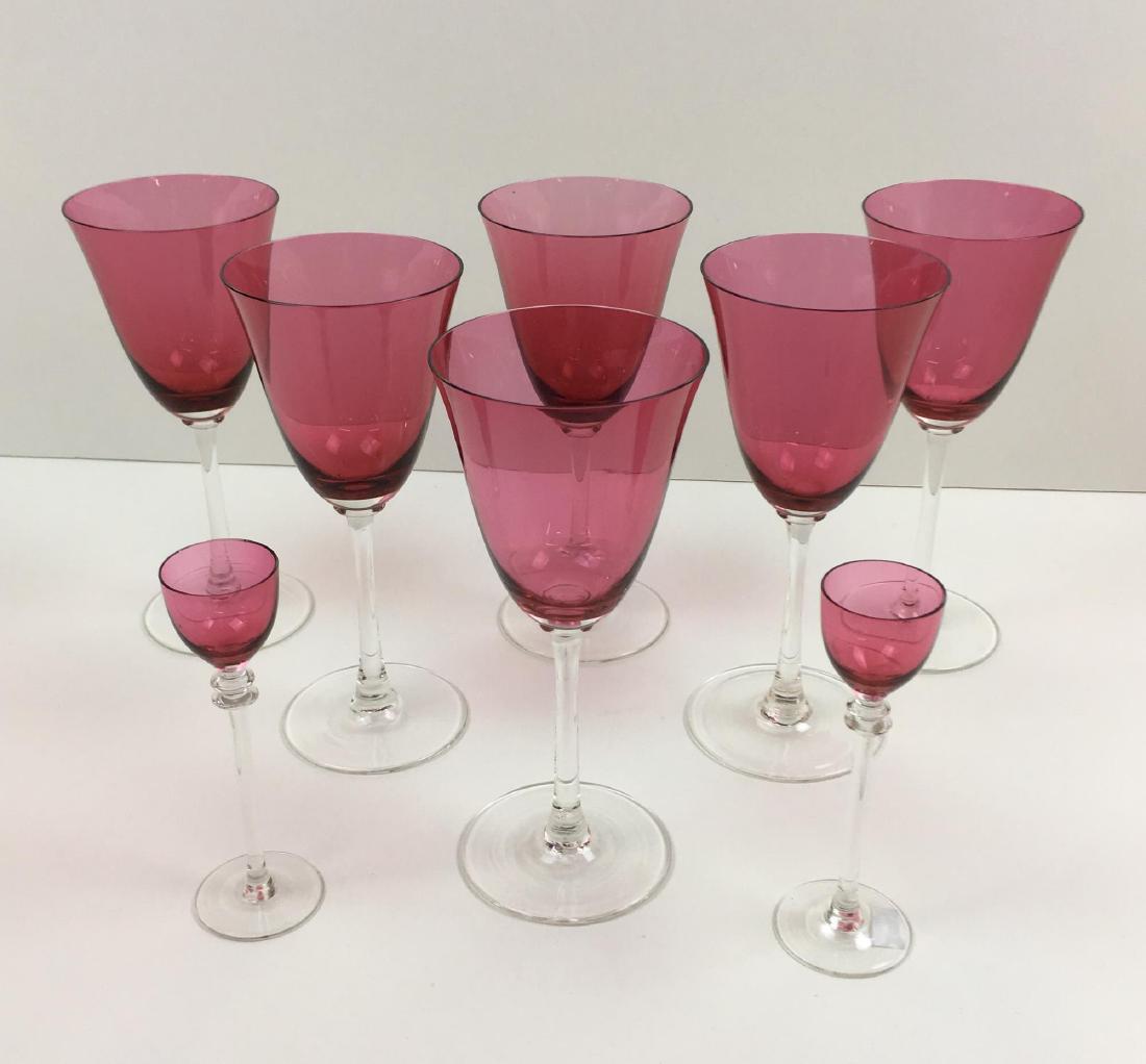 EIGHT CRANBERRY AND CLEAR GLASS STEMS: Blown crystal with cranberry bowls and clear stems - includes 6 wine glasses 8" tall and 2 cordials 5.5" tall - All in good condition