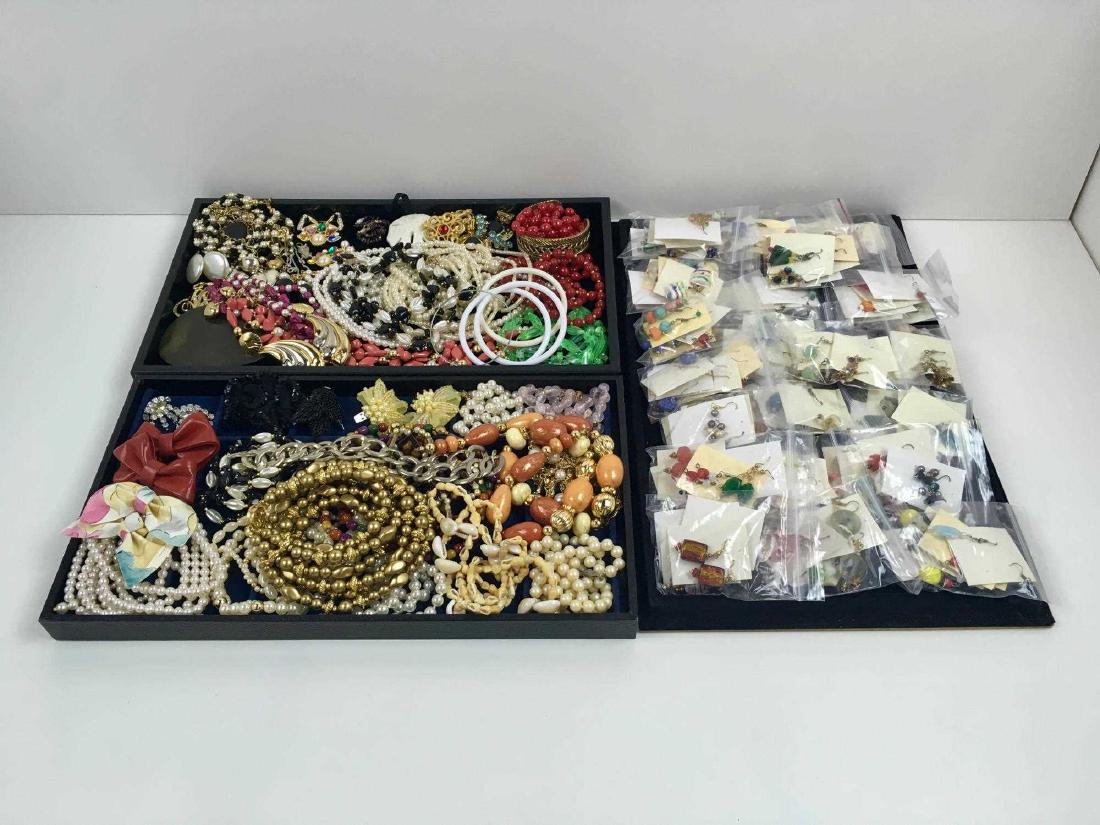 LARGE ASSORTMENT OF COSTUME JEWELRY: Includes both vintage and contemporary - bracelets, necklaces, earrings, pins and shoe clips - one tray has multiple bags of contemporary wire bead earrings with each containing approximately 5 pairs 