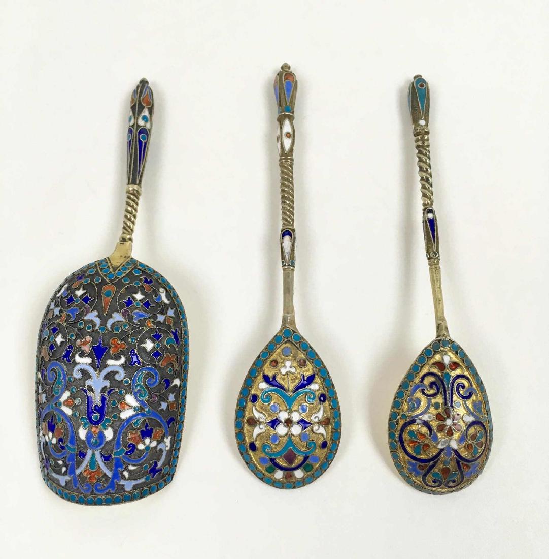3 PCS OF RUSSIAN SILVER AND ENAMEL FLATWARE: Gold washed enameled silver - tea caddy spoon 4.5 inches and 2 egg spoons 4.5 inches both with hallmarks: maker looks to be "CK" ?, assayer's mark "A.A.1892 inches on the caddy spoon only, 84 zolotnik
