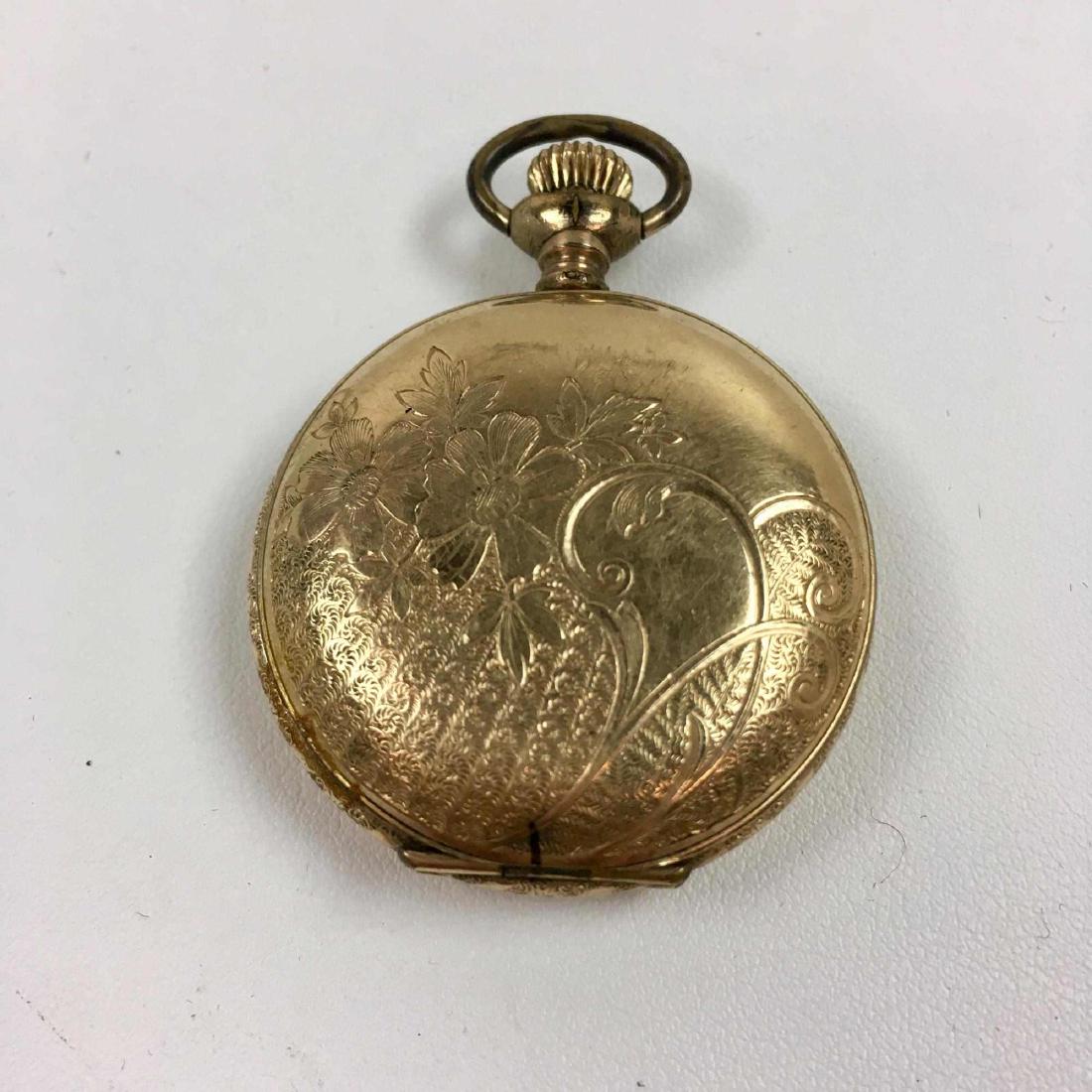 ANTIQUE 7 JEWEL GOLD FILLED ADMIRAL POCKET WATCH: 7 jewel Admiral Tacy Watch Co. Swiss gold filled pocket watch 633020 in a Baystate 20 year case - in non-working condition - measures 1 3/8 inches in diameter