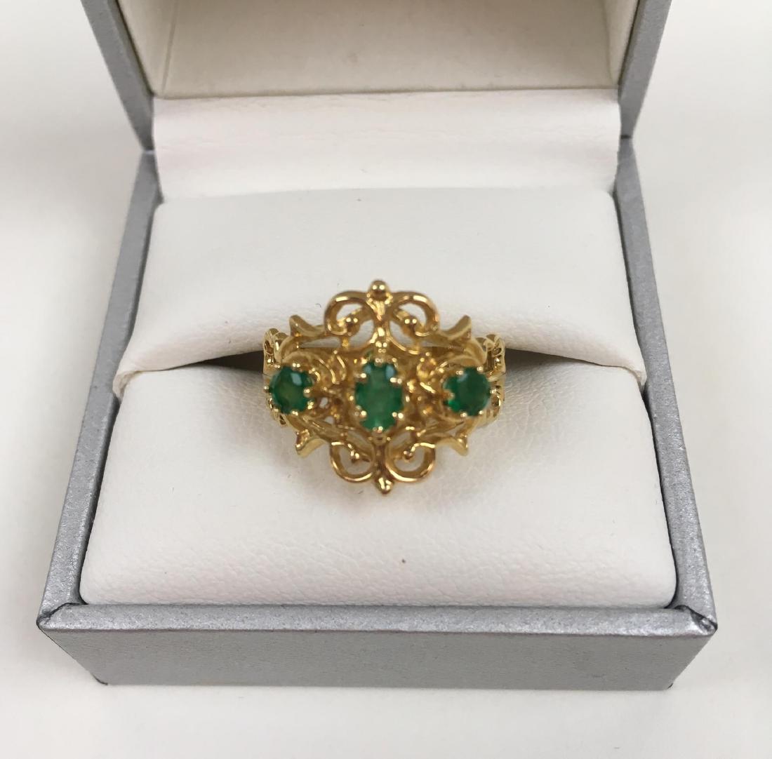 14K YELLOW GOLD AND EMERALD RING: 14 karat yellow gold and emerald ring size 7.75 1 g
