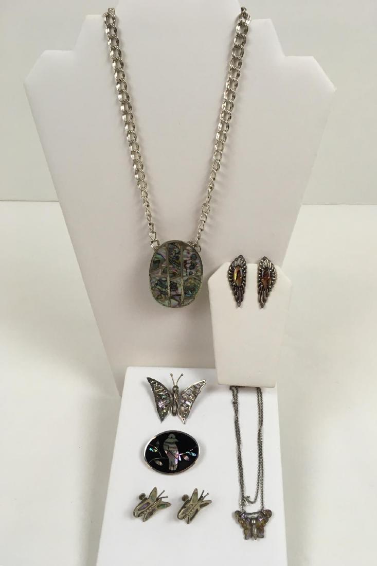 SIX PCS OF JEWELRY: Six pieces of jewelry - sterling necklace and pendant abalone Mexico 16 inches 41 g, 925 necklace with mother of pearl shell butterfly 17 inches 4 g, 925 butterfly pin Mexico 4 g, 925 pin Mexico 9 g m