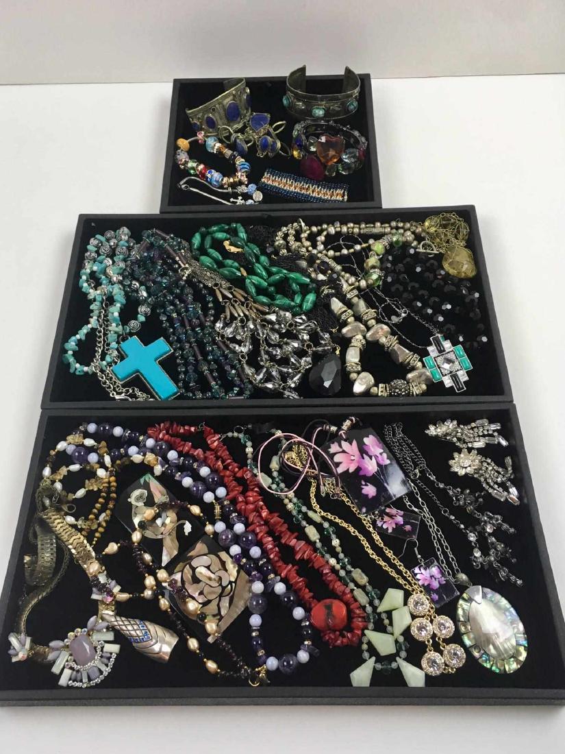 LARGE ASSORTMENT OF COSTUME JEWELRY: Includes bracelets, necklaces, clip earrings - vintage and contemporary - malachite, vintage crystal, abalone, carved stone, inlaid mother of pearl, lapis and more