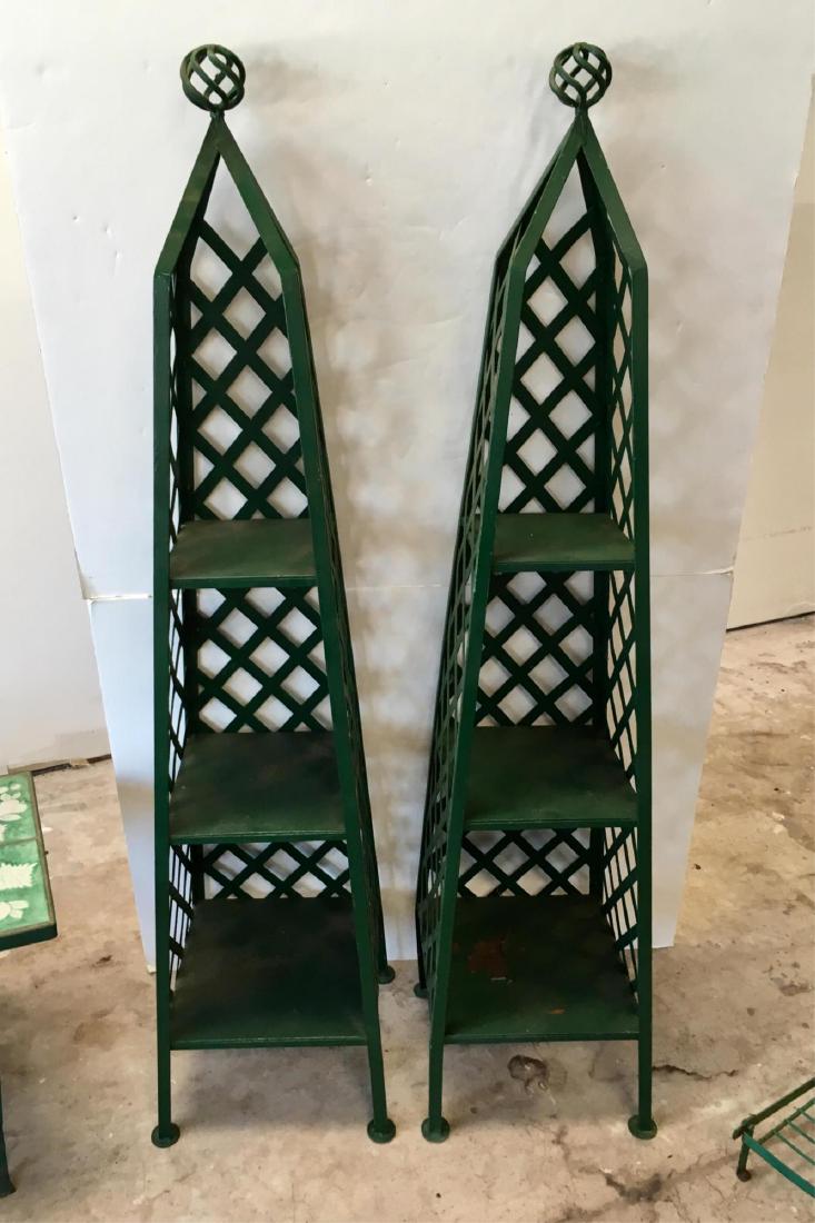 TWO GREEN PAINTED METAL GARDEN SHELVES: Obelisk shape - 61" tall - some paint loss - one has back leg damage - see photo - shipping will be costly due to size / weight, please get a third party shipping estimate before bidding