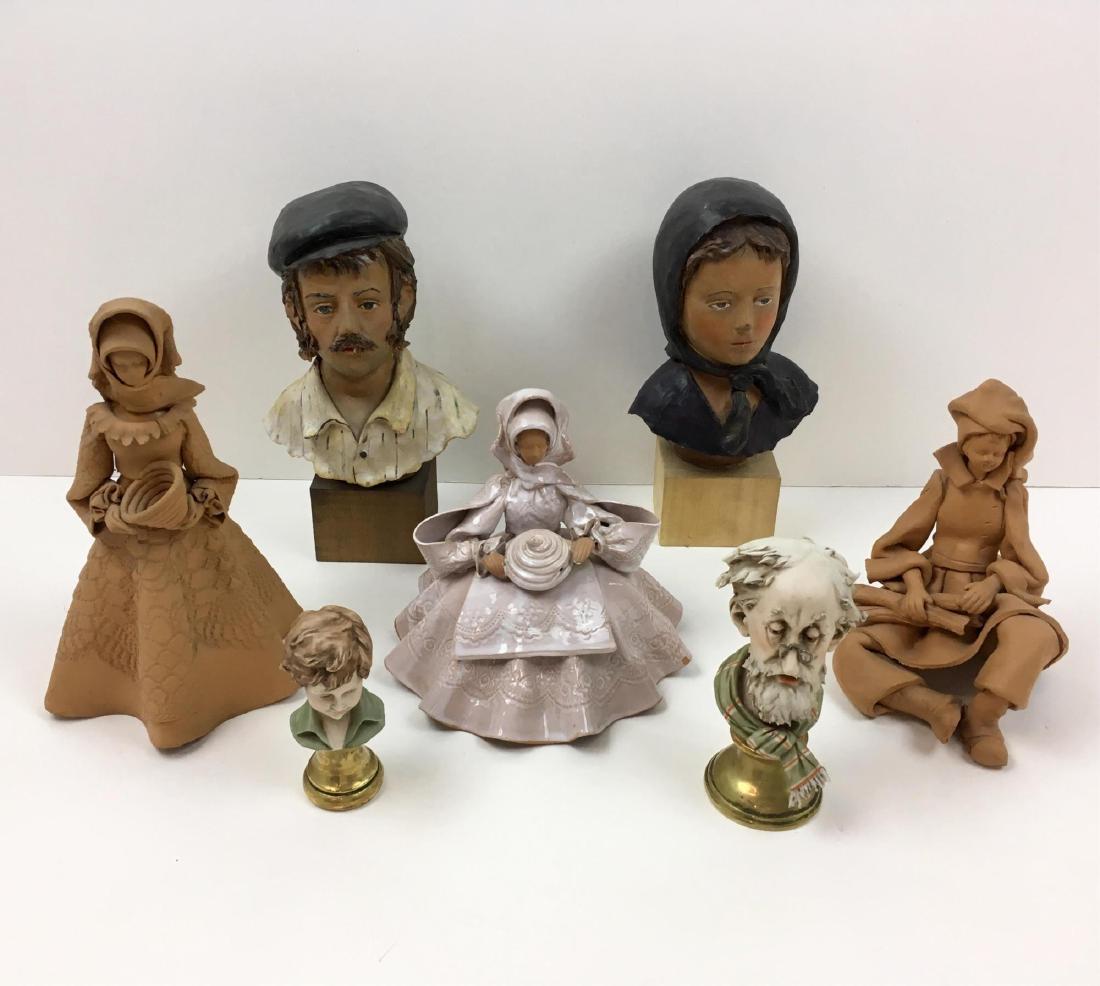 7 PCS OF ITALIAN MADE DECORATIVES: 3 terracotta figures signed P. Serra Olbia Italy tallest is 8" (glazed female has small chip - see photo), 2 composite busts on wood bases approx. 7.5" tall and 2 hand painted porcelain busts on gilt