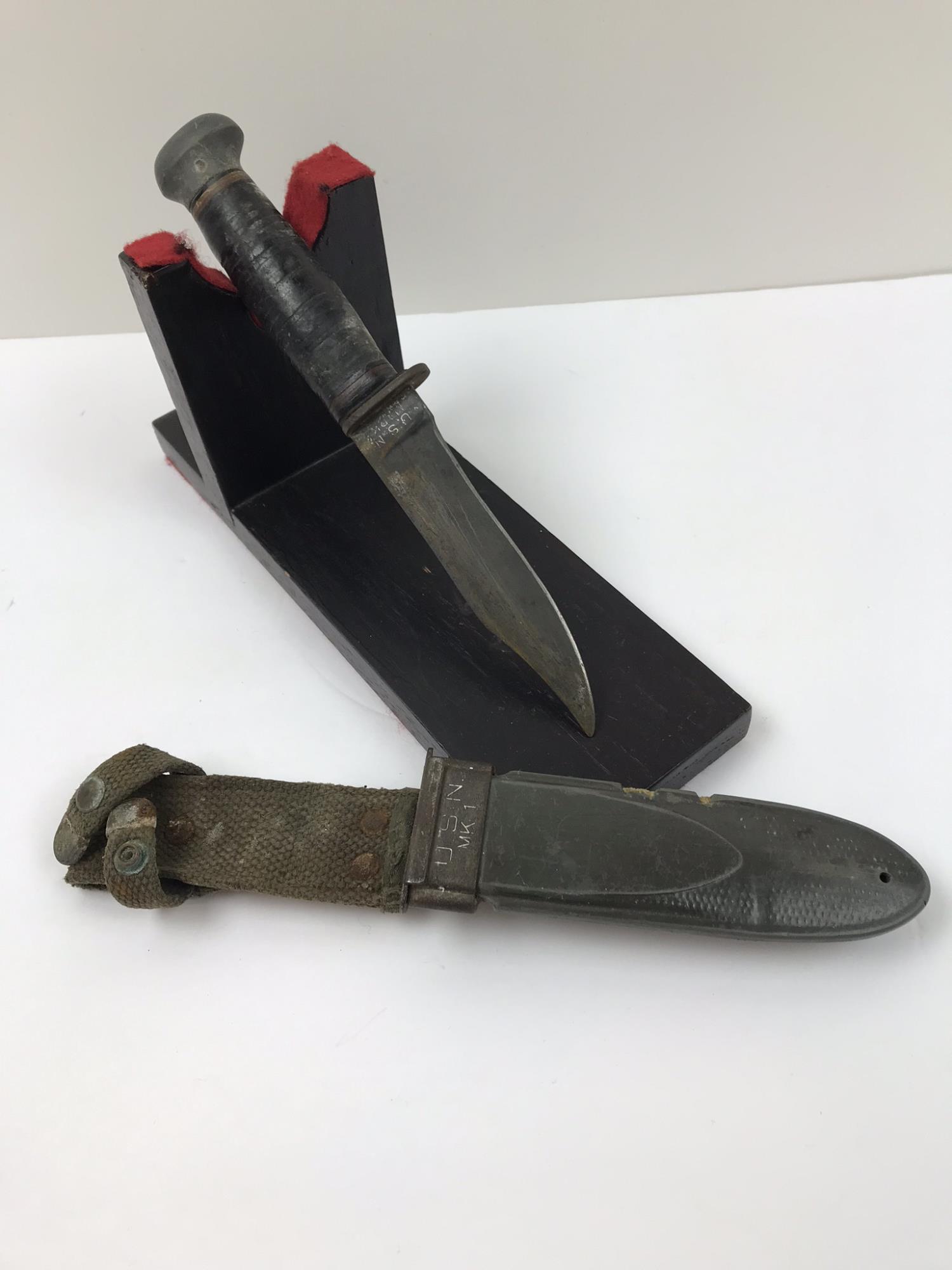 USN MK1 WITH SHEATH: The Navy MK1 knife was used as both a utility knife and a fighting weapon.