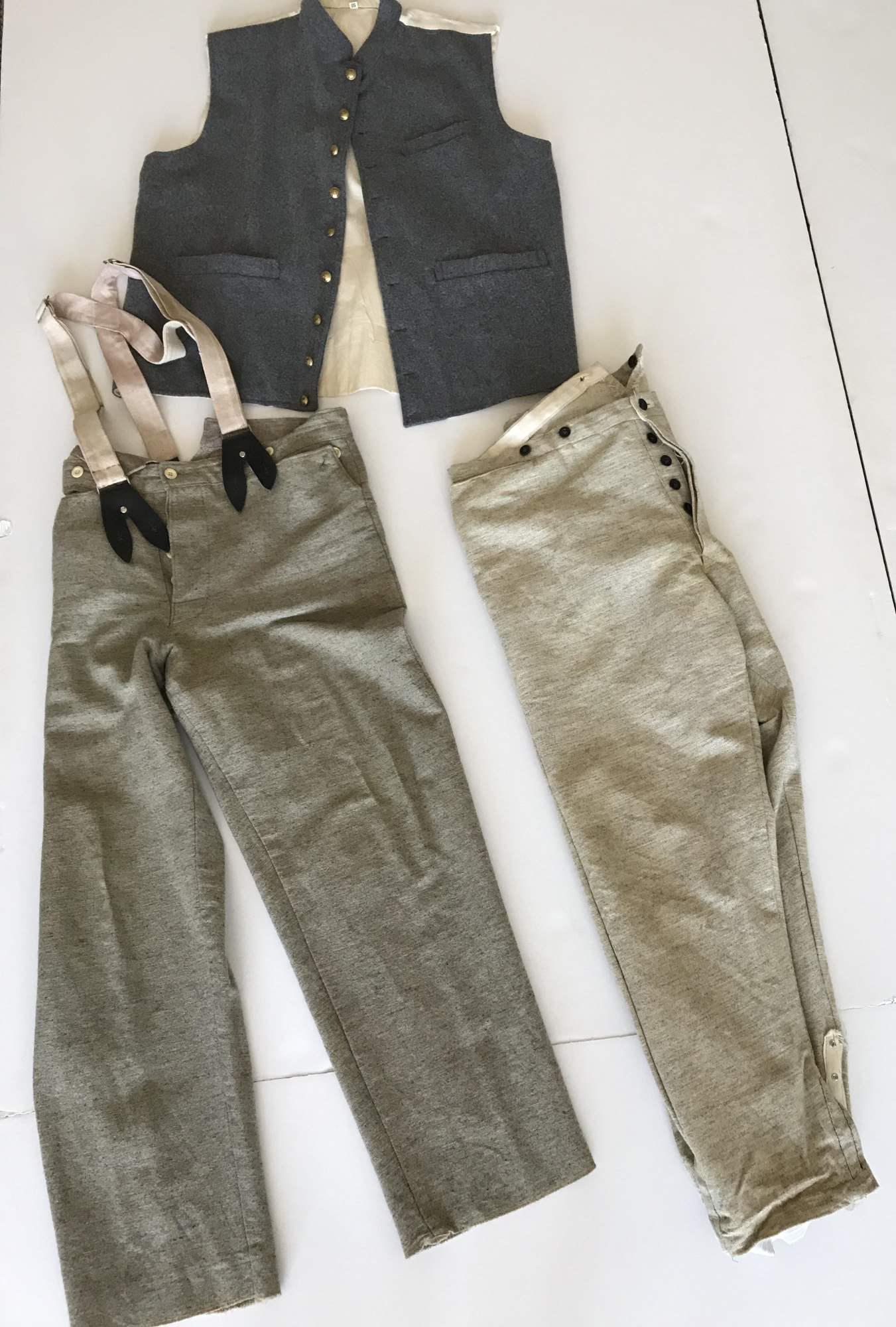 3 PC. CIVIL WAR RE-ENACTMENT VEST AND PANTS: CS Enlisted vest - medium grey wool - "CSA" buttons - size 50, 2 pair Jean Wool trousers - size 44 - 1 pair of suspenders - suspenders show red discoloration