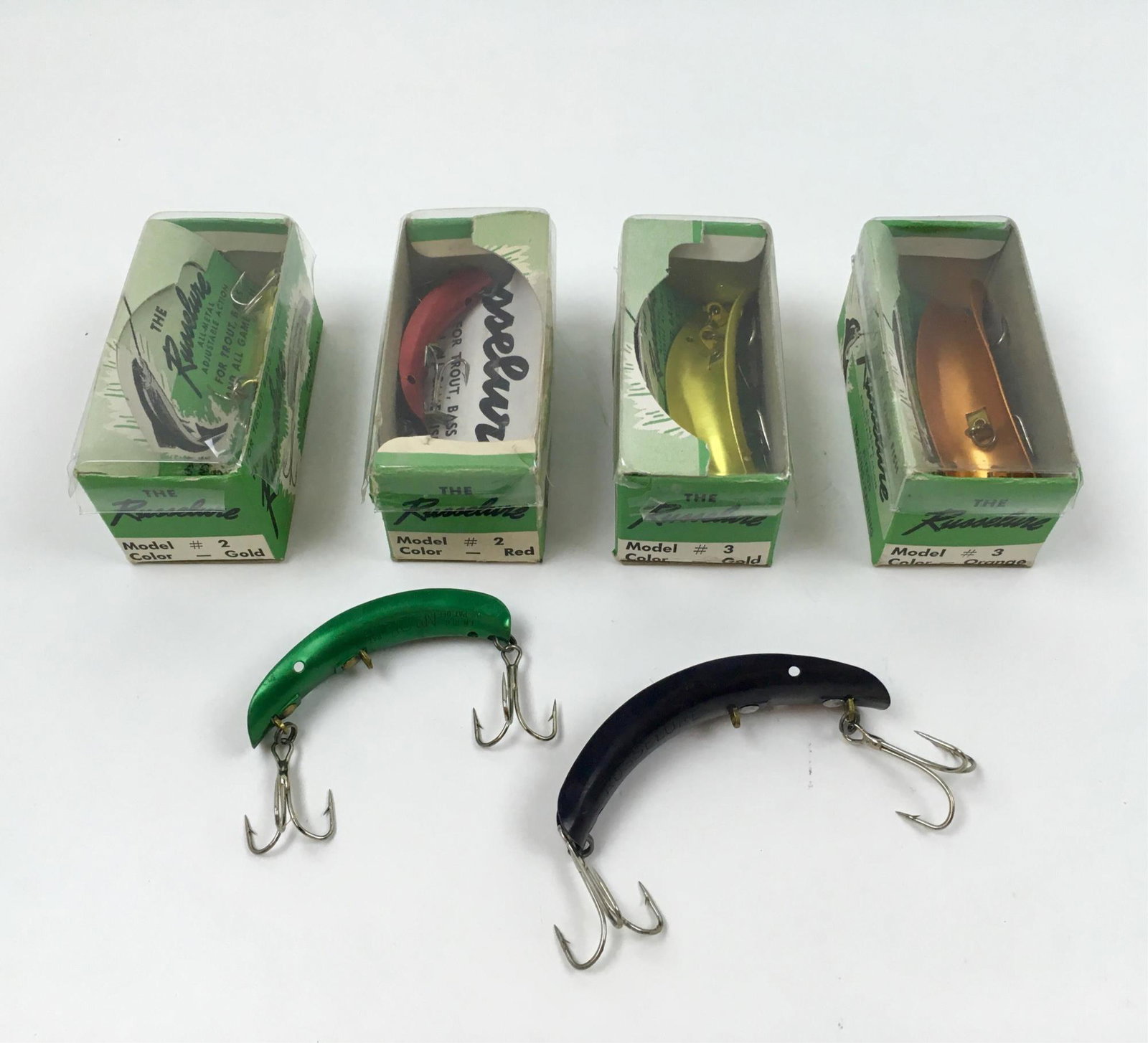 6 VINTAGE RUSSEIURE FISHING LURES: 6 vintage Russelure fishing lures - 4 are NIB 2 #3 and 2 #2 - plus 2 loose - 2 1/2 and 3