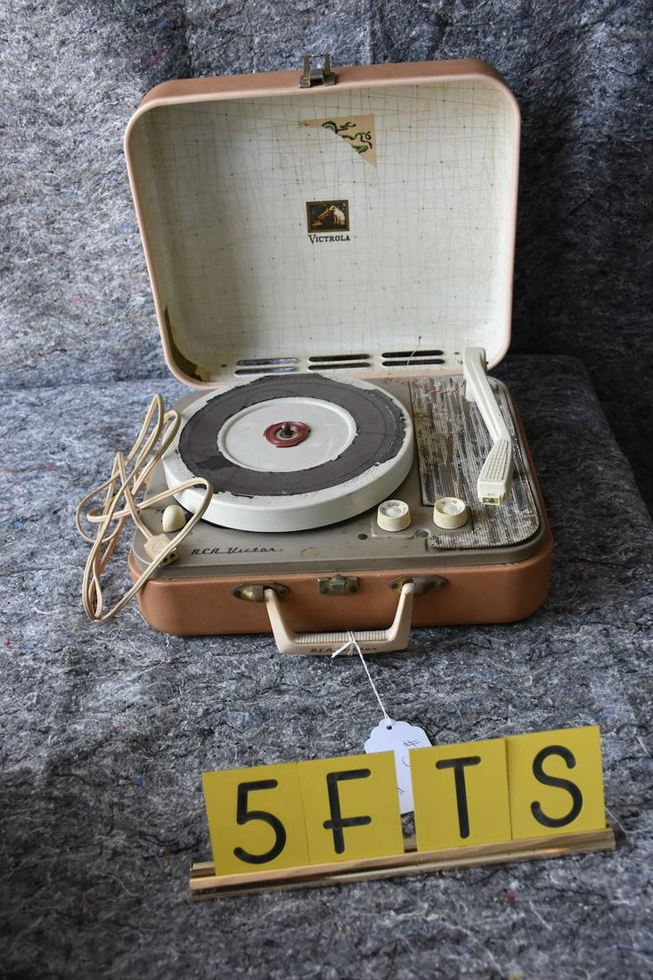 Suitcase Model Portable Phonograph: Victor metal case model. Plays 45 rpm records with good interior decal