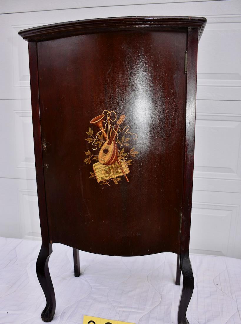 Mahogany Record or Piano Roll Cabinet: Single bow front door with decal of instruments