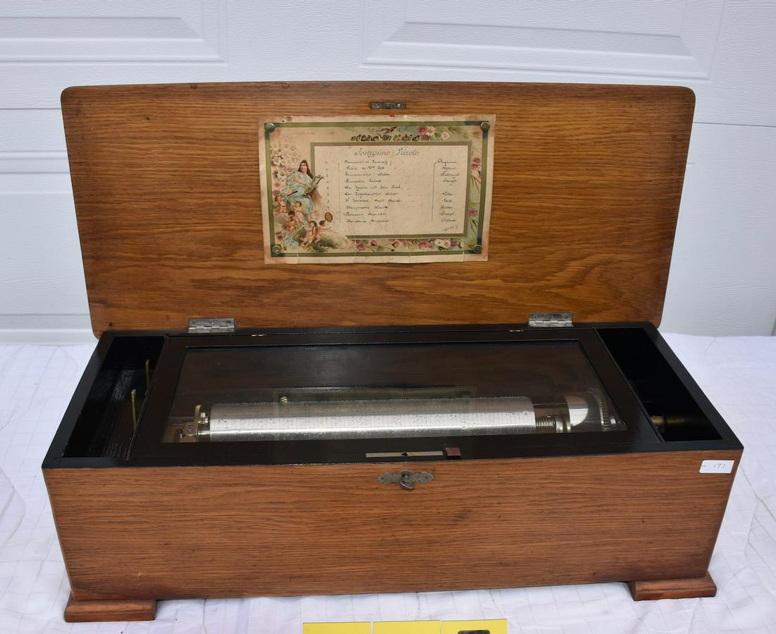 Fortissimo Piccolo Cylinder Music Box: 10 tune with original tune card, 13" cylinder. Oak case. No broken teeth, Outside winding crank