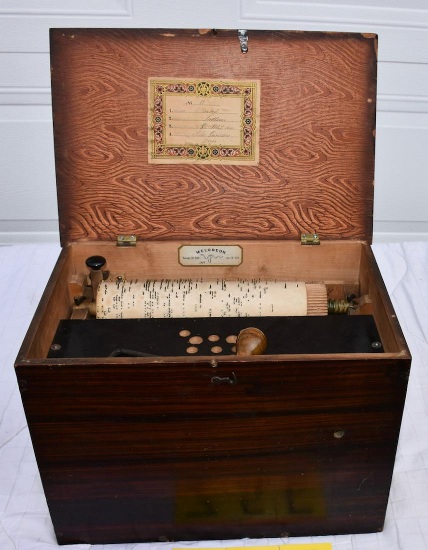 Melodeon 4 tune wooden barrel organ: A good machine, needs some work with crank mechanism and bellows. Tune sheet intact.