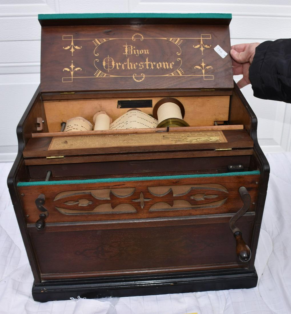 Bijou Orchestrone Paper Roll Organ: Walnut stenciled case. 2 Paper rolls included, a nice example