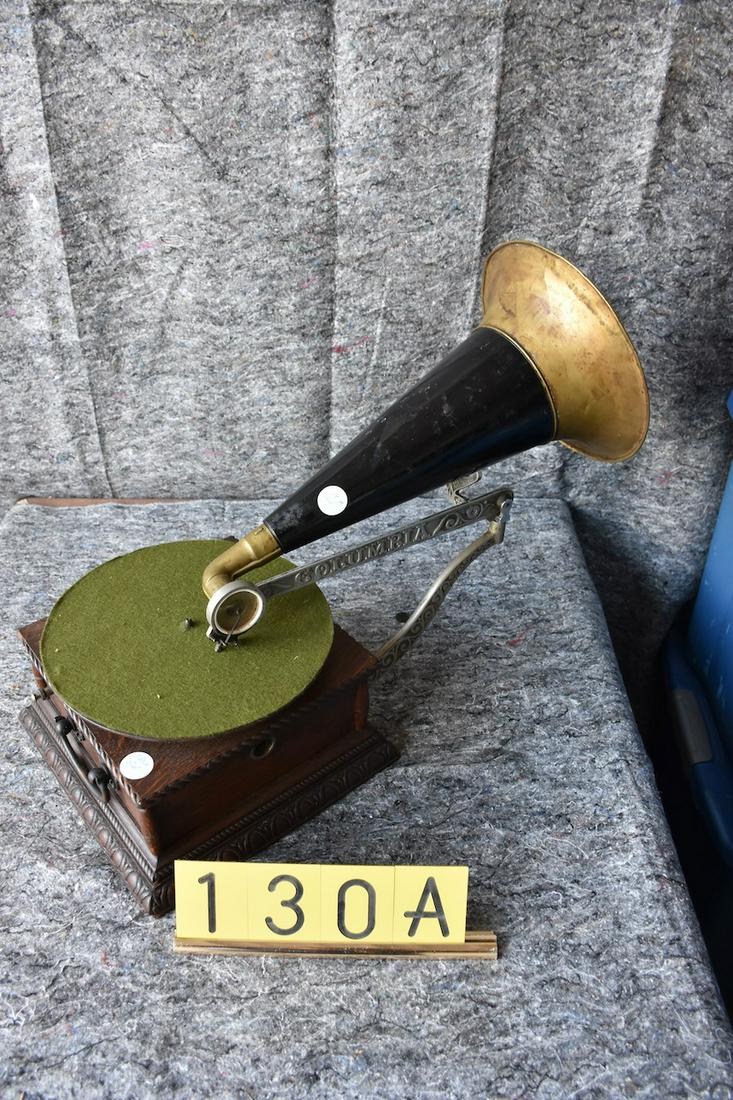 Columbia AJ disc phonograph.: Early style with front mount brass bell horn. No crank